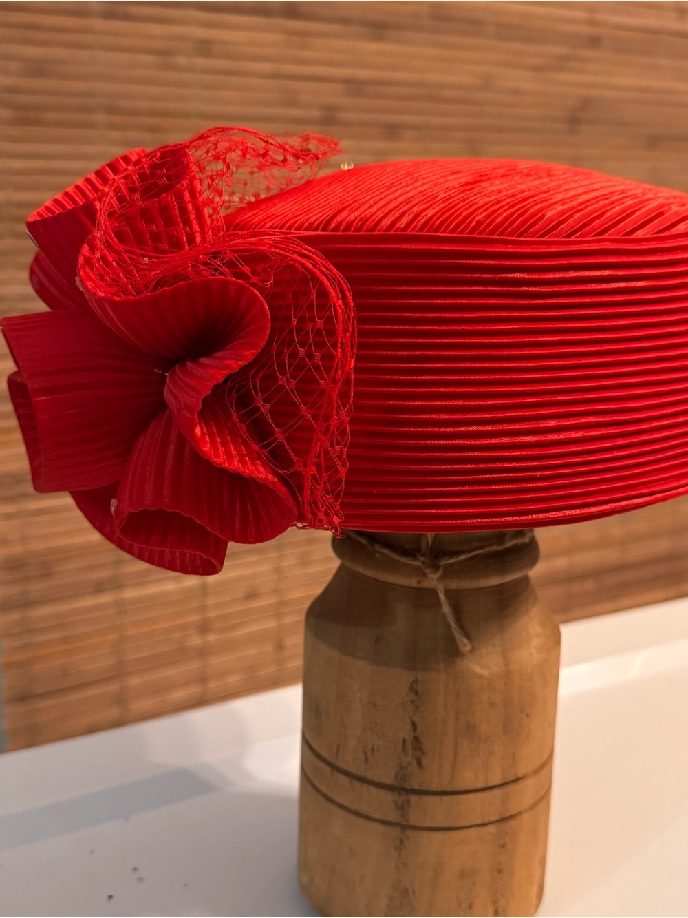 Elegant Red Pillbox Hat with Sculpted Bow Accent